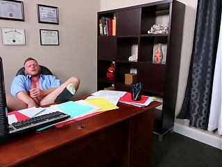 Horny Brian Bonds jerks his cock in the office 